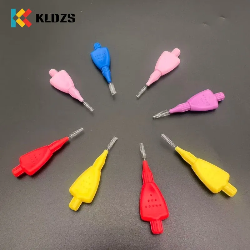 Cepillo interdental en forma de avión